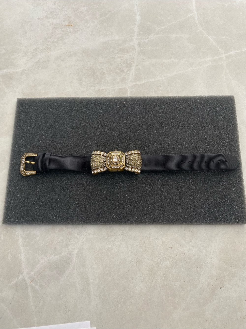 Heidi Daus Black Bow Watch with Gold Rhinestone Center - needs battery